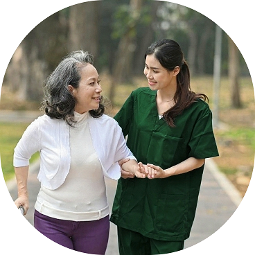 Ewa Care caregiver walking with client